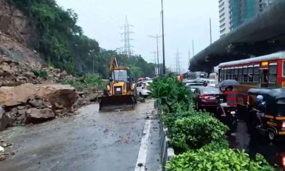 Heavy rains pound Mumbai, landslide hits road, rail traffic